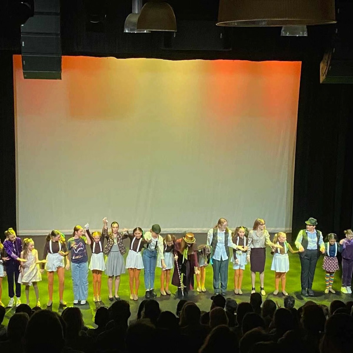 Charlie and the Chocolate Factory cast taking a bow